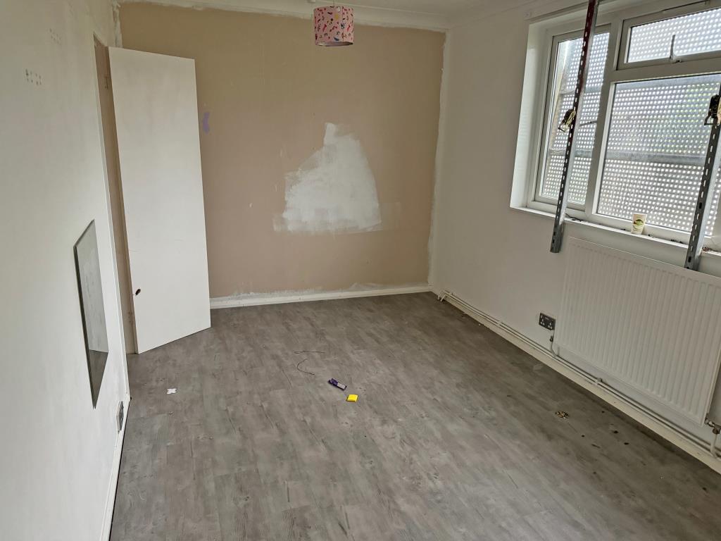 Lot: 12 - THREE-BEDROOM HOUSE FOR IMPROVEMENT AND REPAIR - Bedroom 1